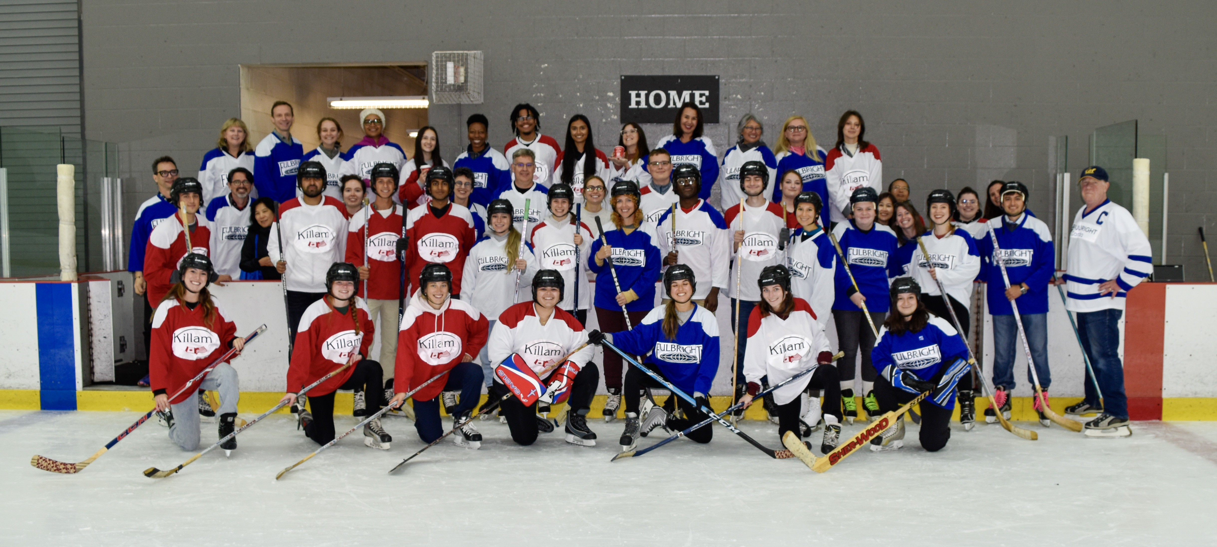 A grantee poses with their hockey team.